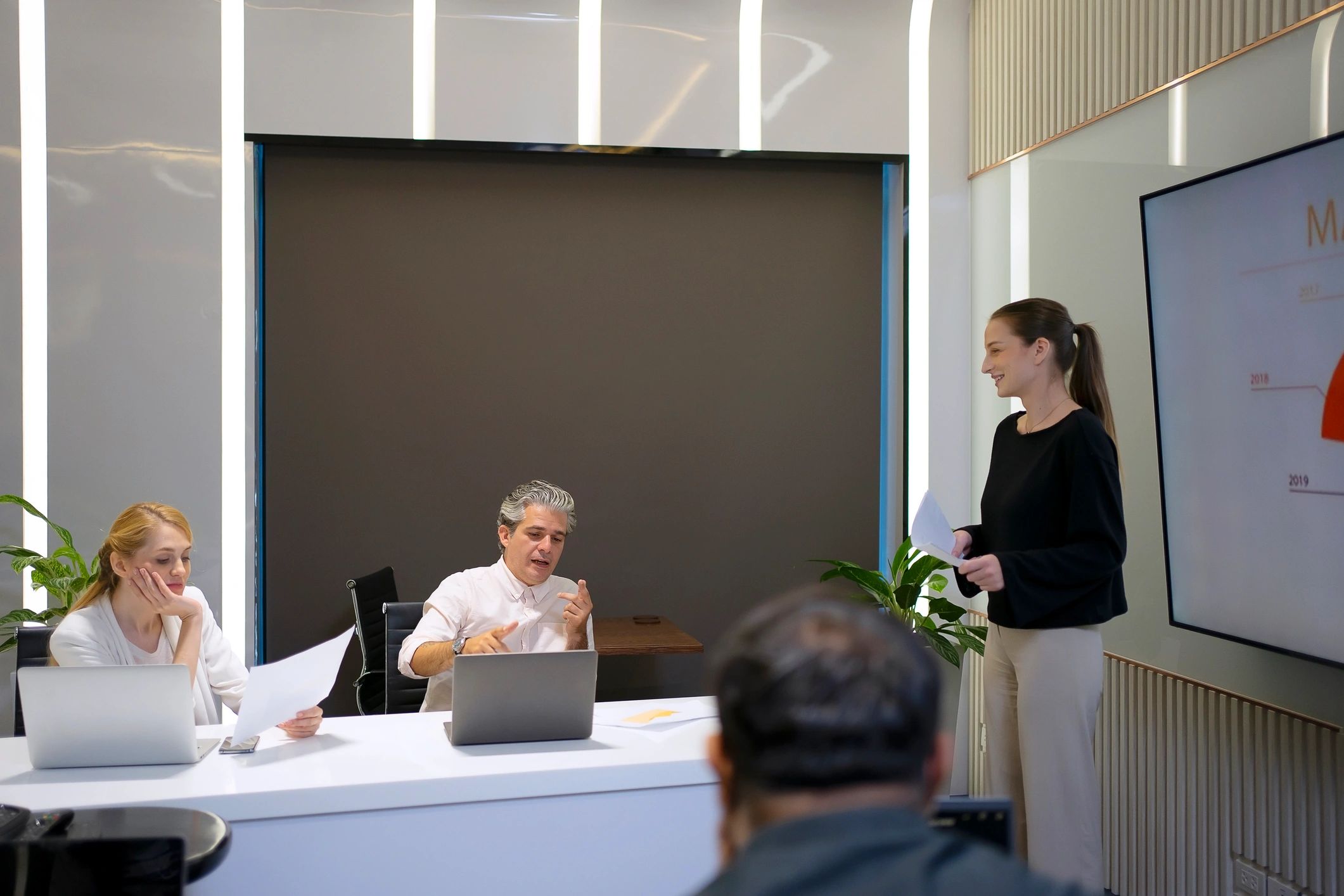Payroll team meeting in an office