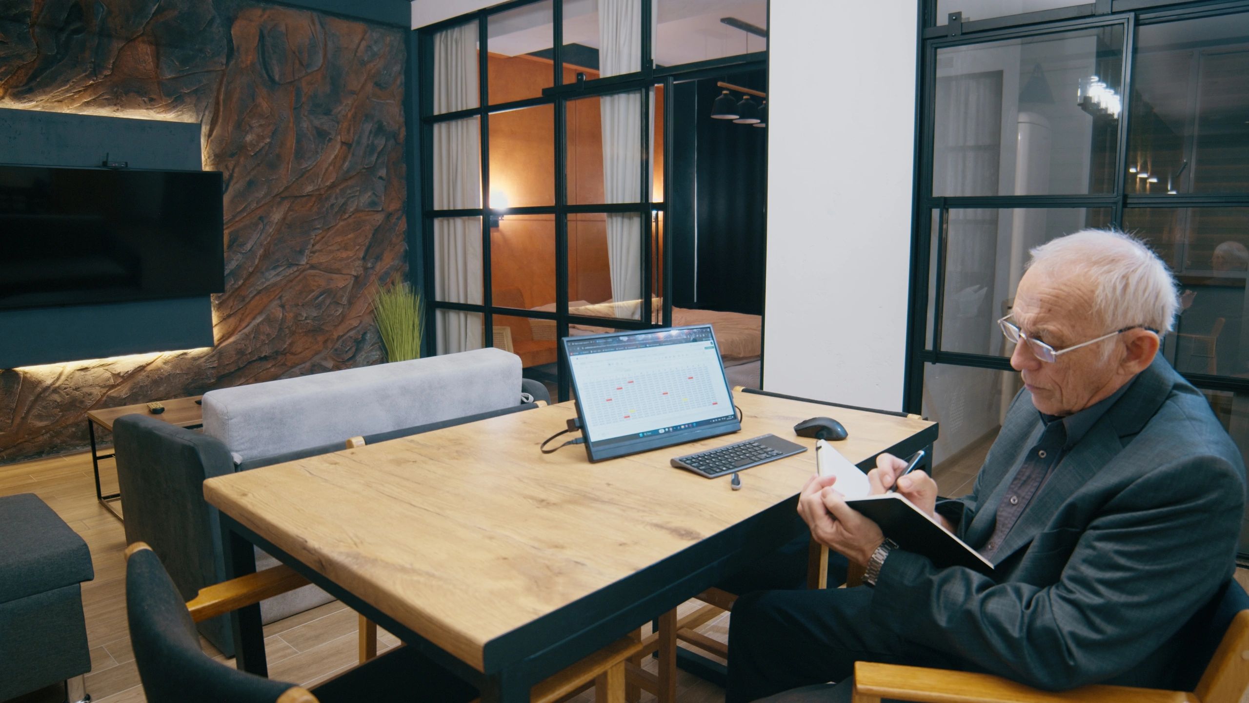 Accountant reviewing payroll notes at a computer