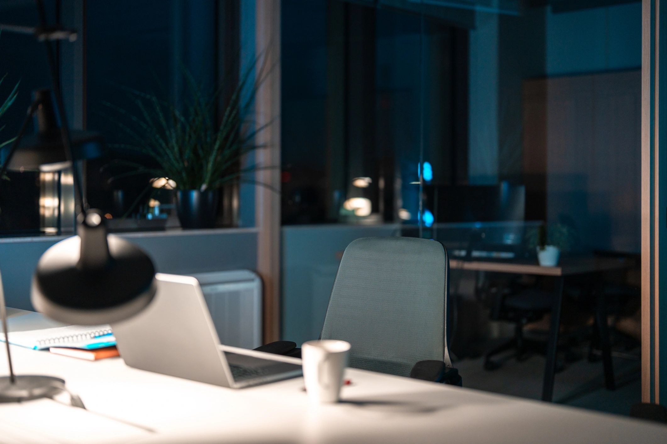Modern workspace with computer showing finance dashboard
