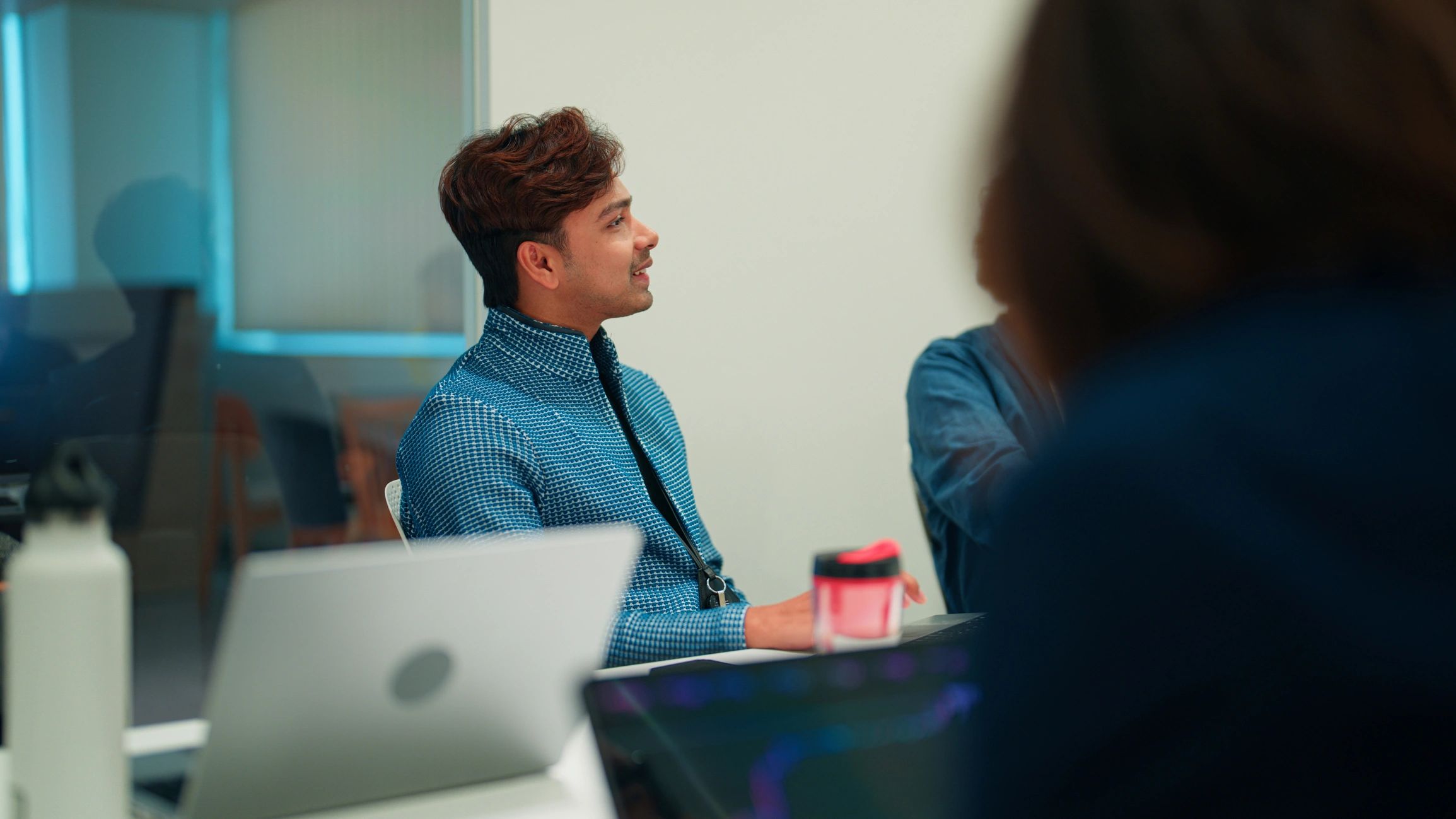 PayRoute team collaborating in a modern office