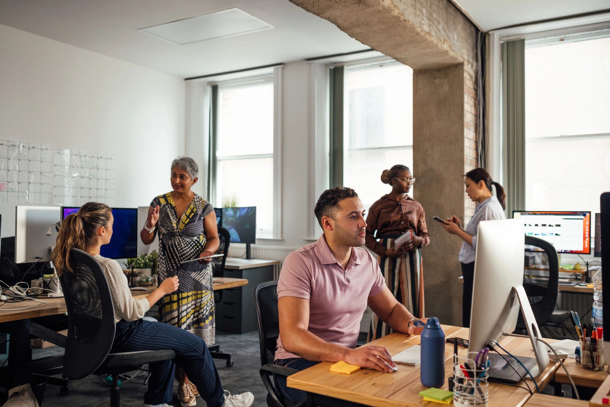 Business professionals collaborating in a modern office